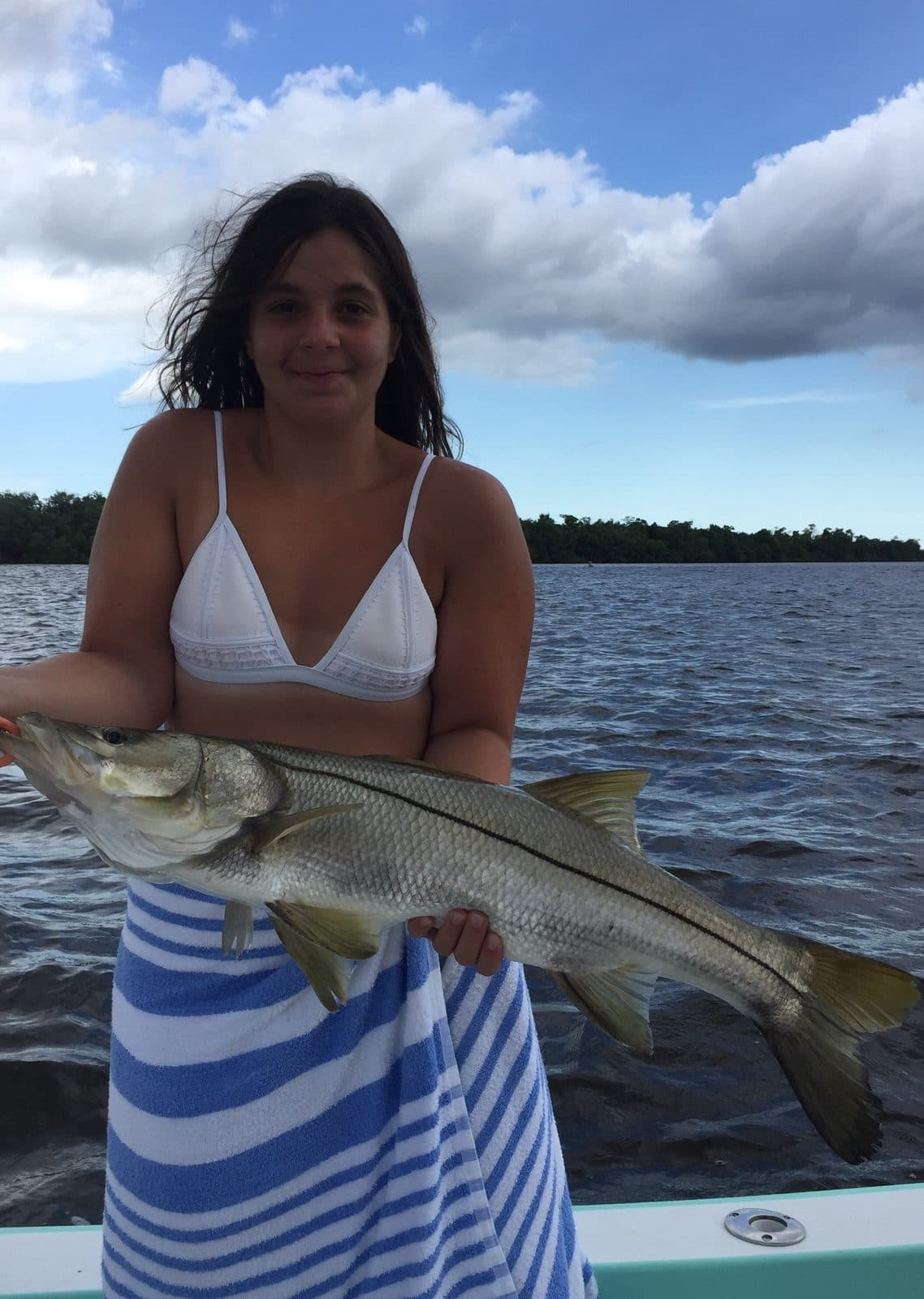 Angler holding a snook