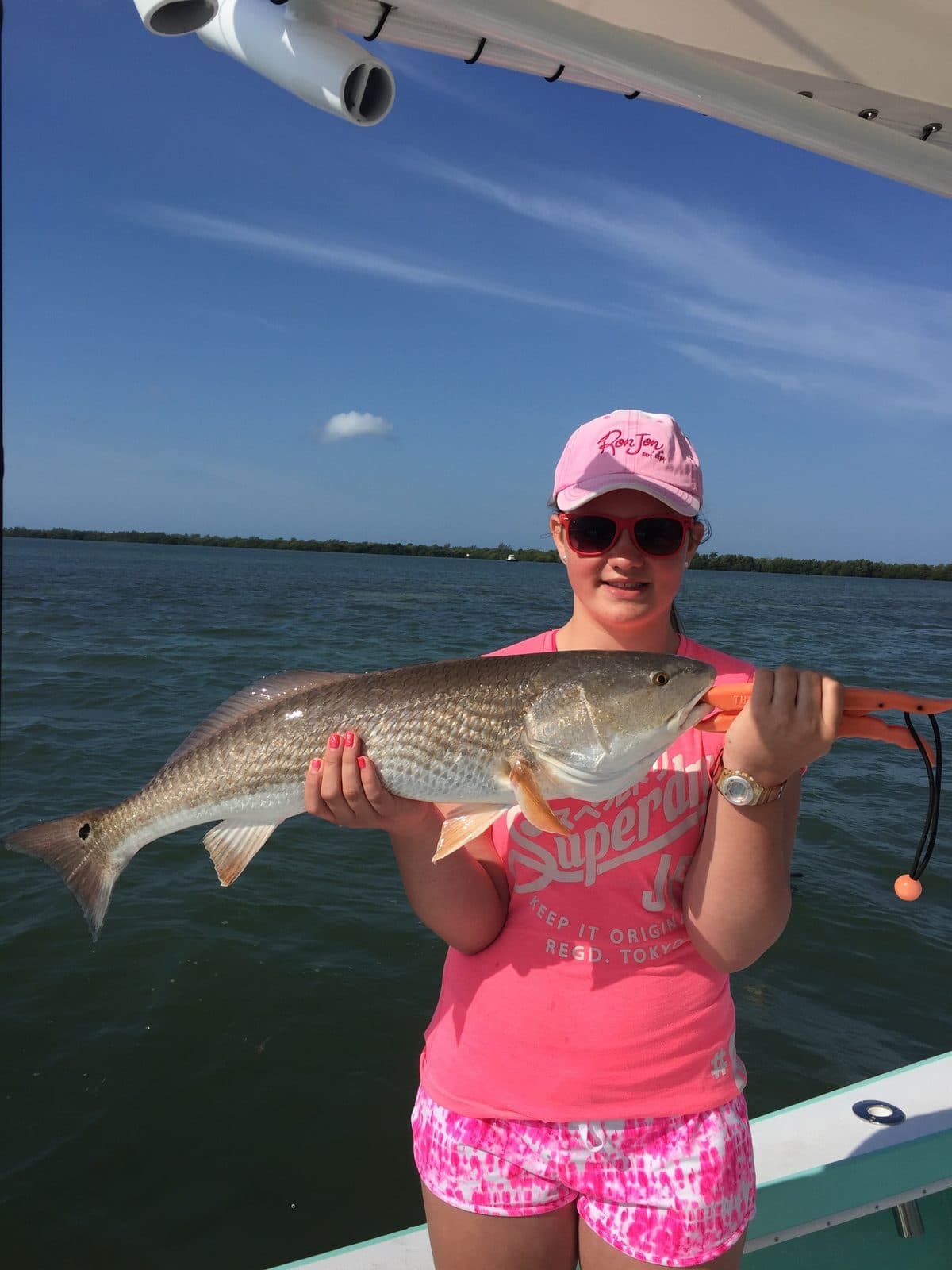 Young angler with a redfish