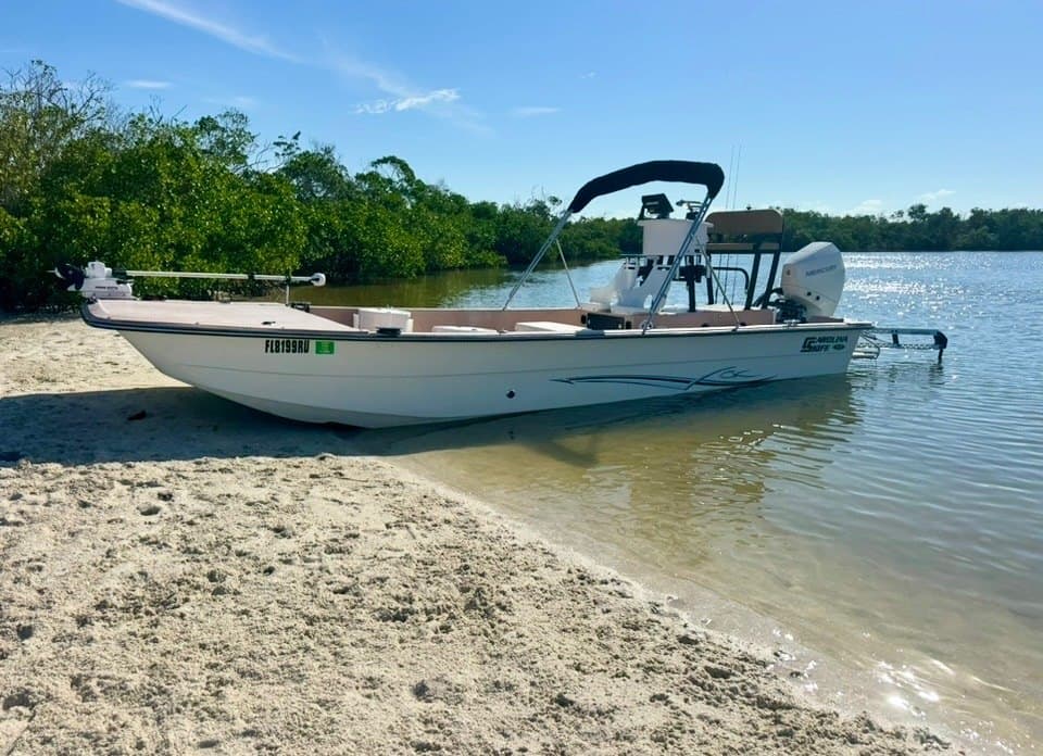 Capt. Alan's Carolina Skiff beached on a sandbar